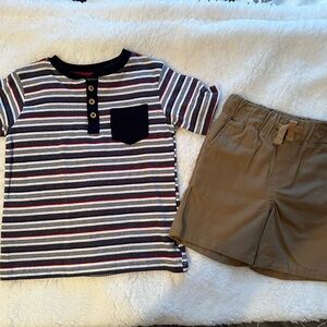 Brand new. Never worn. We removed tags but shirts still has the plastic loop.